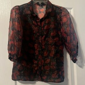 Beautiful sheer floral blouse. Puffy sleeves. Size M